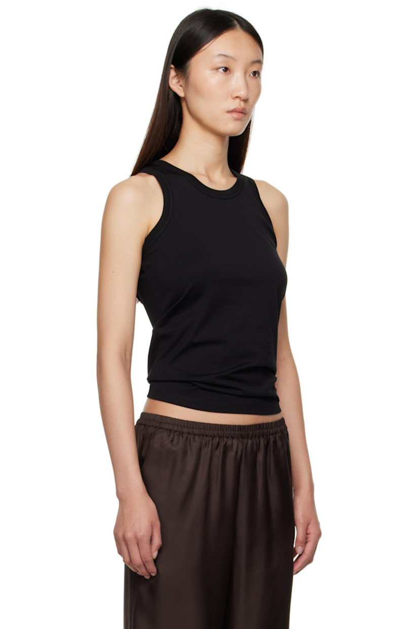 Organic supima cotton jersey tank top.

· GOTS-certified organic cotton
· Lightweight
· Rib-knit crewneck and armscyes
· Logo embroidered at front hem

Supplier color: Black