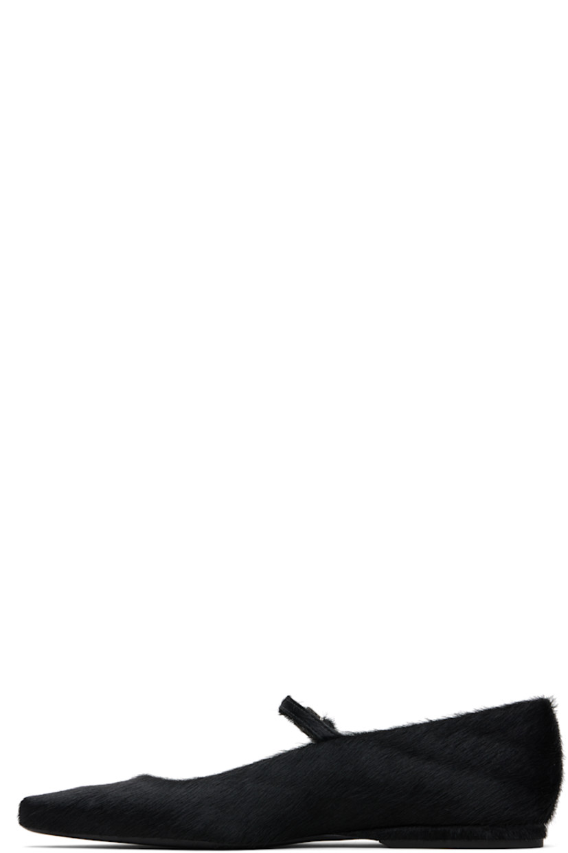 Calf-hair Mary-Jane-style flats.

· Pointed toe
· Pin-buckle strap at vamp
· Buffed leather lining
· Rubber heel
· Leather sole

Supplier color: Black