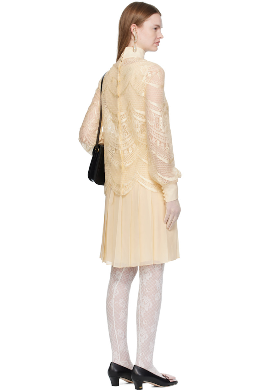 Viscose-blend georgette midi dress. 

· Layered construction
· Detachable lace overlay with press-stud fastening at back
· Round neck
· Darts at front
· Pleats at skirt 
· Concealed zip closure at back
· Fully lined

Supplier color: Betulla