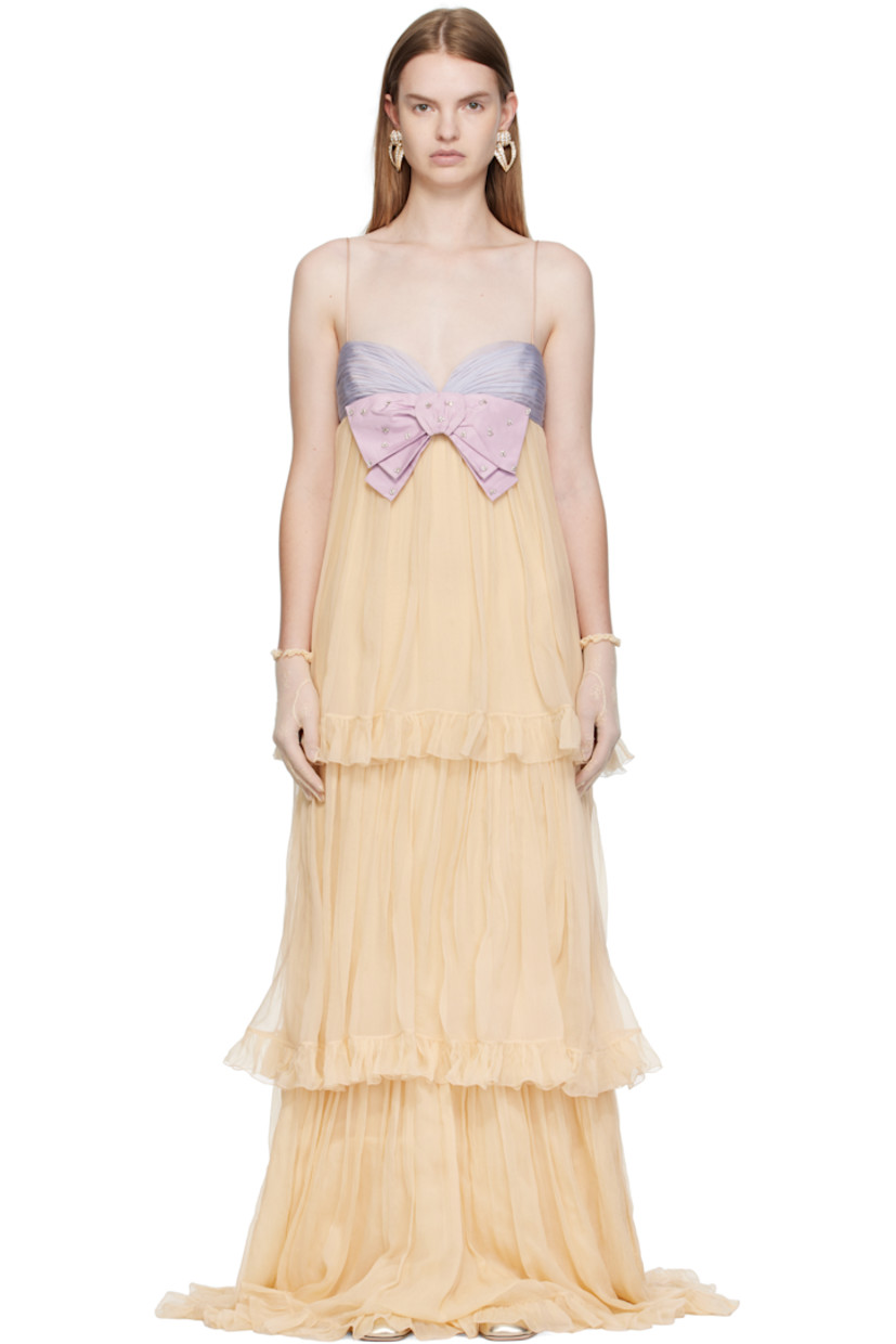 Silk crepon maxi dress. 

· Gathering and ruffles throughout
· Tiered construction
· Sweetheart neck
· Bow accent with hand-embellished detailing at chest
· Concealed zip closure at side
· Fixed spaghetti straps
· Fully lined

Supplier color: Natural rafia