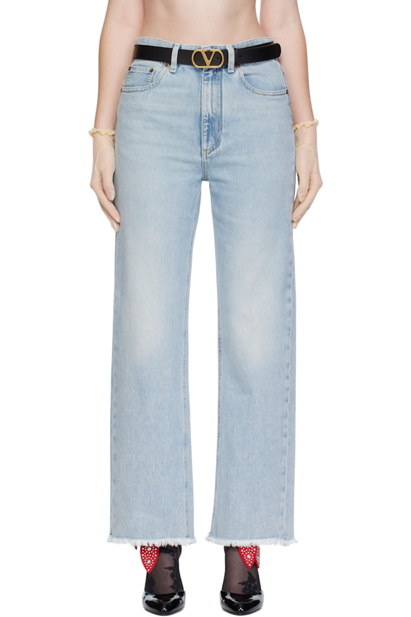 Non-stretch denim jeans.

· Fading throughout
· Belt loops
· Five-pocket styling
· Zip fly
· Frayed edge at cuffs
· Leather logo patch at back waistband
· Logo-engraved bronze-tone hardware
· Contrast stitching in yellow

Supplier color: Denim blue