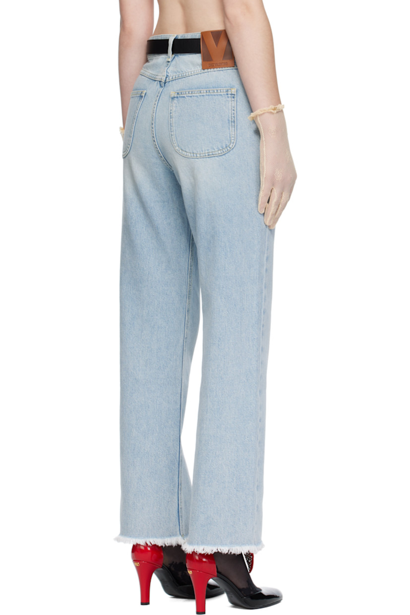 Non-stretch denim jeans.

· Fading throughout
· Belt loops
· Five-pocket styling
· Zip fly
· Frayed edge at cuffs
· Leather logo patch at back waistband
· Logo-engraved bronze-tone hardware
· Contrast stitching in yellow

Supplier color: Denim blue