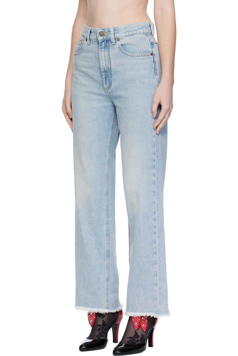 Non-stretch denim jeans.

· Fading throughout
· Belt loops
· Five-pocket styling
· Zip fly
· Frayed edge at cuffs
· Leather logo patch at back waistband
· Logo-engraved bronze-tone hardware
· Contrast stitching in yellow

Supplier color: Denim blue