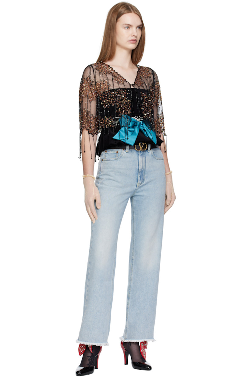Non-stretch denim jeans.

· Fading throughout
· Belt loops
· Five-pocket styling
· Zip fly
· Frayed edge at cuffs
· Leather logo patch at back waistband
· Logo-engraved bronze-tone hardware
· Contrast stitching in yellow

Supplier color: Denim blue
