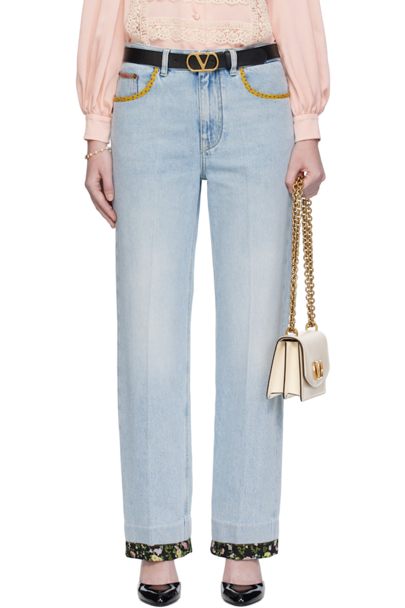 Non-stretch denim jeans.

· Fading and floral-printed trim throughout
· Belt loops
· Five-pocket styling
· Zip fly
· Creased legs
· Leather logo patch at back waistband
· Logo-engraved bronze-tone hardware
· Contrast stitching in yellow

Supplier color: Denim