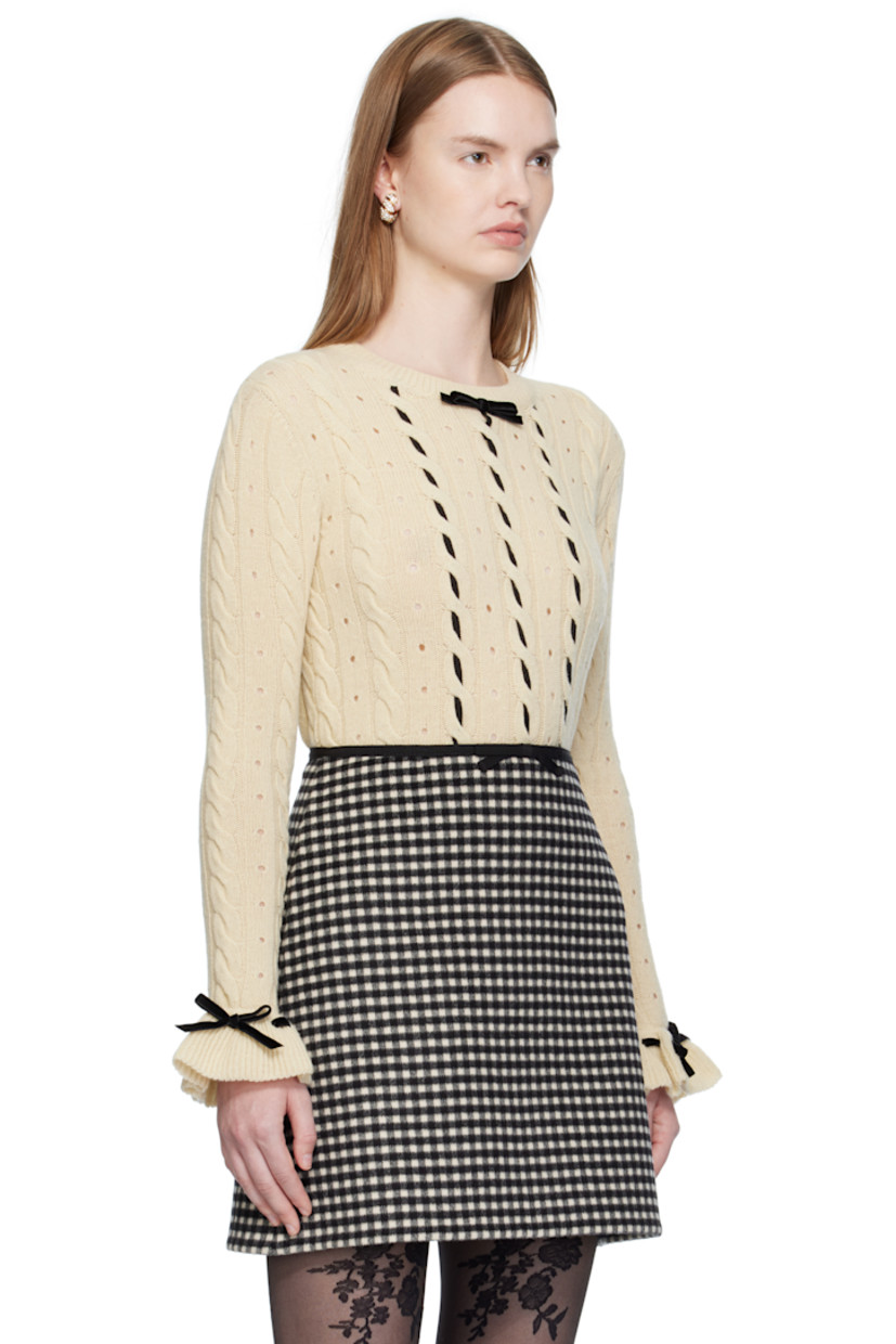 Cable-knit virgin wool sweater. 

· Perforations throughout
· Rib-knit crewneck, hem, and cuffs
· Bow accent and lace-up detailing at collar and cuffs
· Grosgrain trim woven at front

Supplier color: Betulla