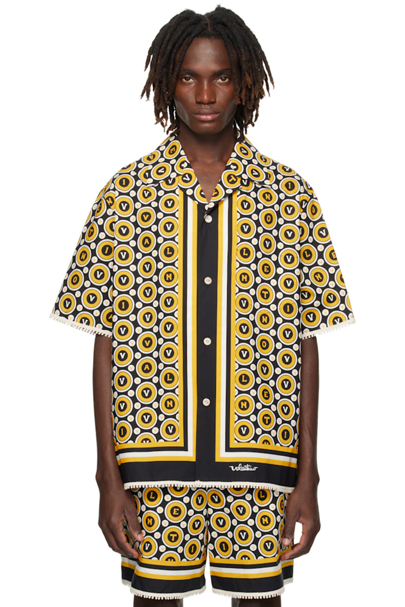 Cotton poplin shirt.

�· Logo and polka-dot pattern printed throughout
· Open spread collar
· Button closure
· Patch pocket at chest
· Embroidered detailing at hem and cuffs

Supplier color: Black/Yellow/Ivory