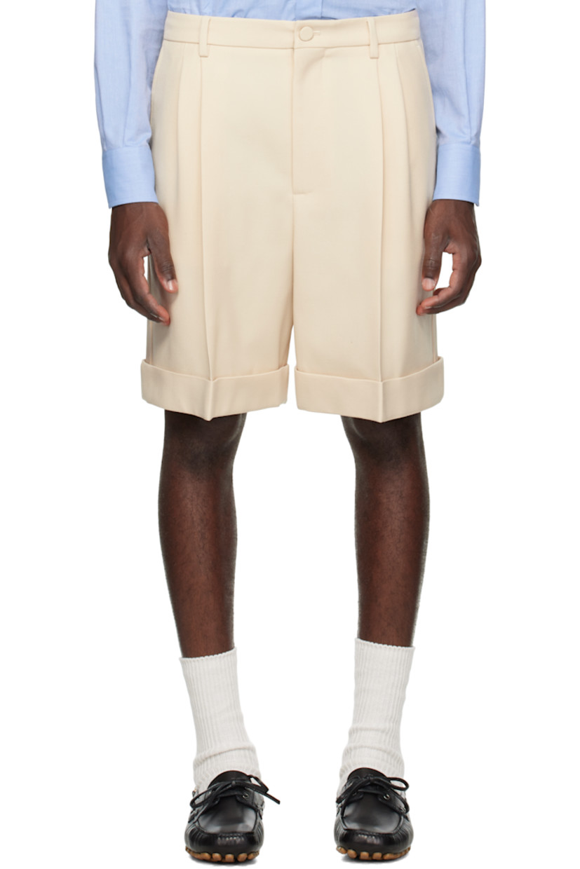 Virgin wool twill shorts.

· Belt loops
· Four-pocket styling
· Zip fly
· Pleats at front
· Creased legs
· Rolled cuffs
· Full satin lining

Supplier color: Burro