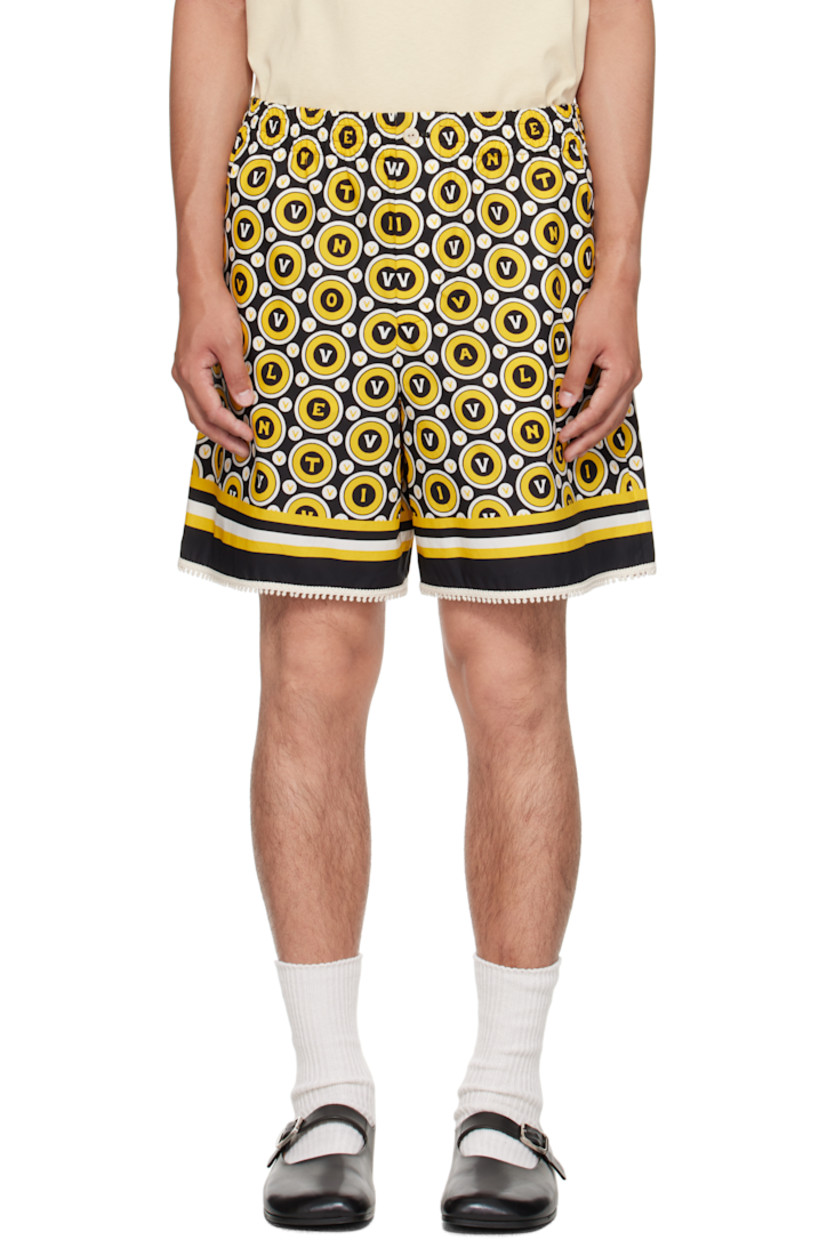 Cotton poplin shorts.

· Logo and graphic pattern printed throughout 
· Concealed drawstring at elasticized waistband 
· Three-pocket styling
· Zip fly 
· Crocheted detailing at cuffs 

Supplier color: Black/Yellow/Ivory