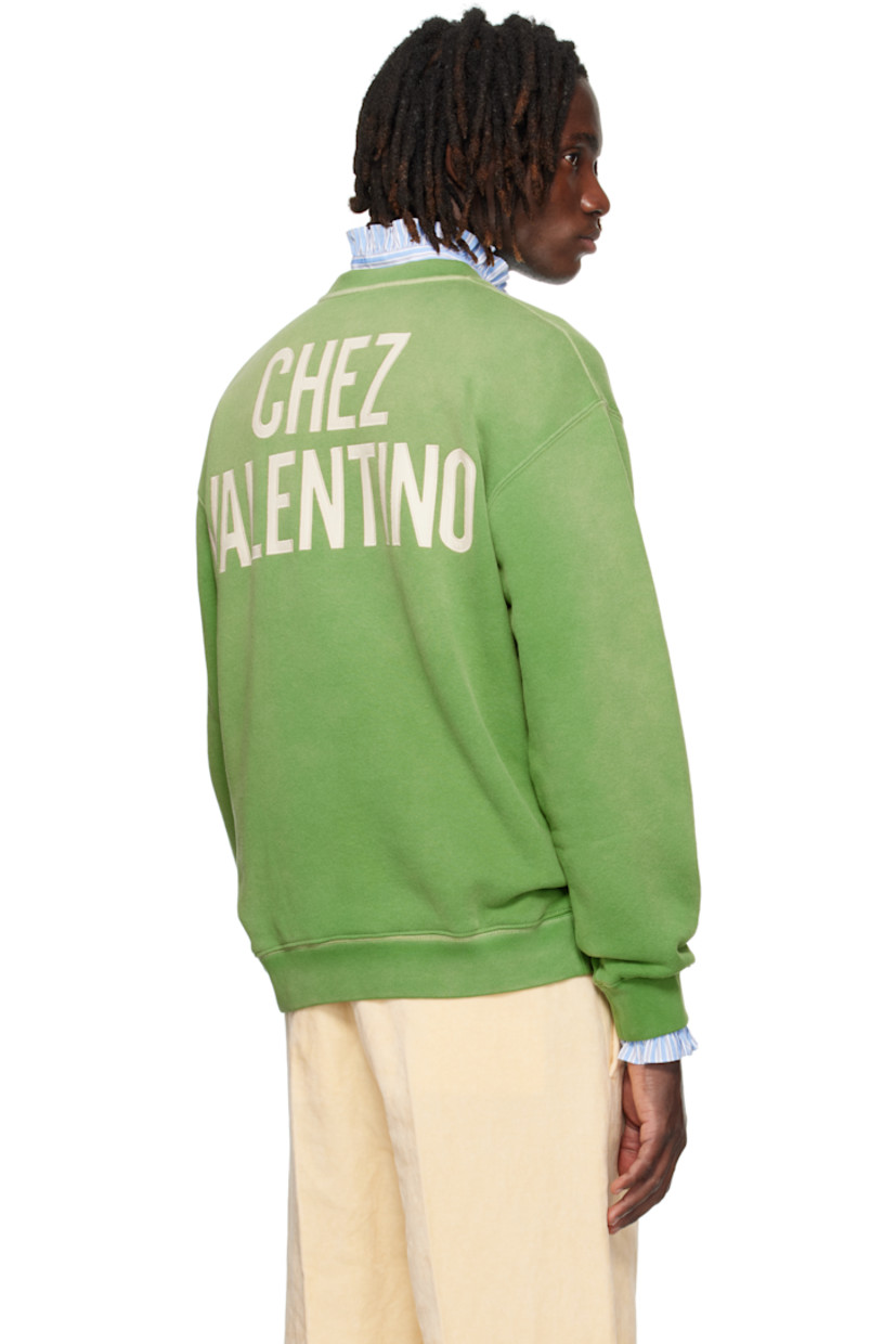Cotton French terry sweatshirt.

· Fading throughout
· Rib-knit crewneck, hem, and cuffs
· Text printed at chest
· Dropped shoulders
· Logo appliqués at back

Supplier color: Laurel