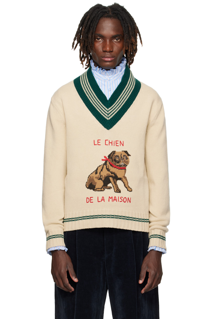 Knit virgin wool sweater.

· Striped rib-knit V-neck, hem, and cuffs
· Jacquard graphic and embroidered text at front

Supplier color: Cream