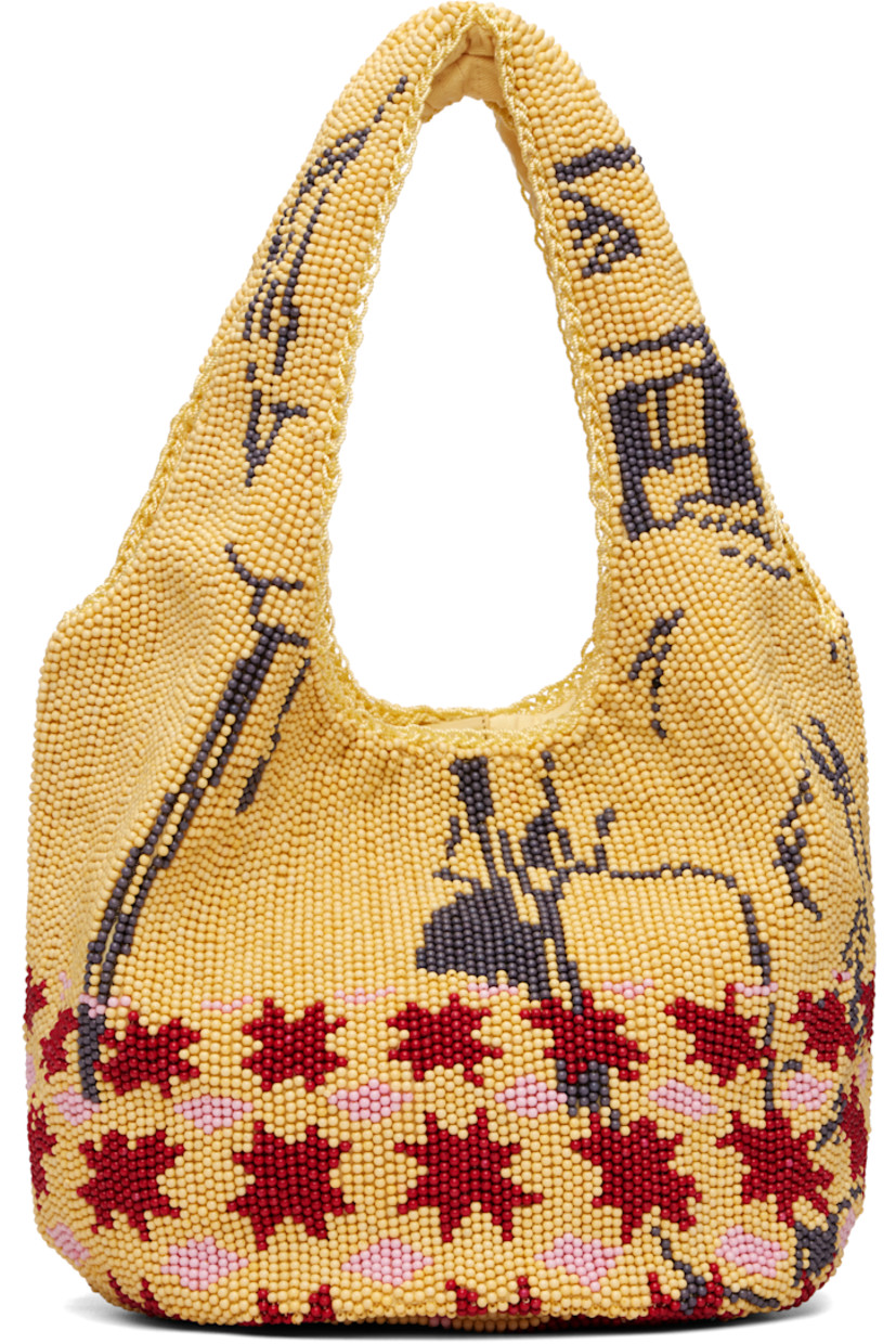 Beaded tote. 

· Graphic pattern throughout
· Integrated carry handles
· Magnetic press-stud closure 
· Cotton twill lining
· H7" x W12" x D8"

Supplier color: Multi