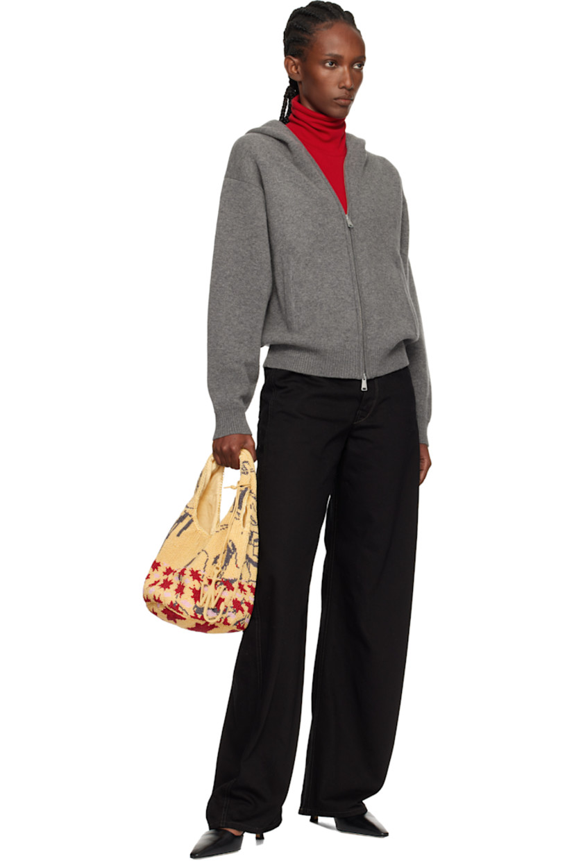 Beaded tote. 

· Graphic pattern throughout
· Integrated carry handles
· Magnetic press-stud closure 
· Cotton twill lining
· H7" x W12" x D8"

Supplier color: Multi