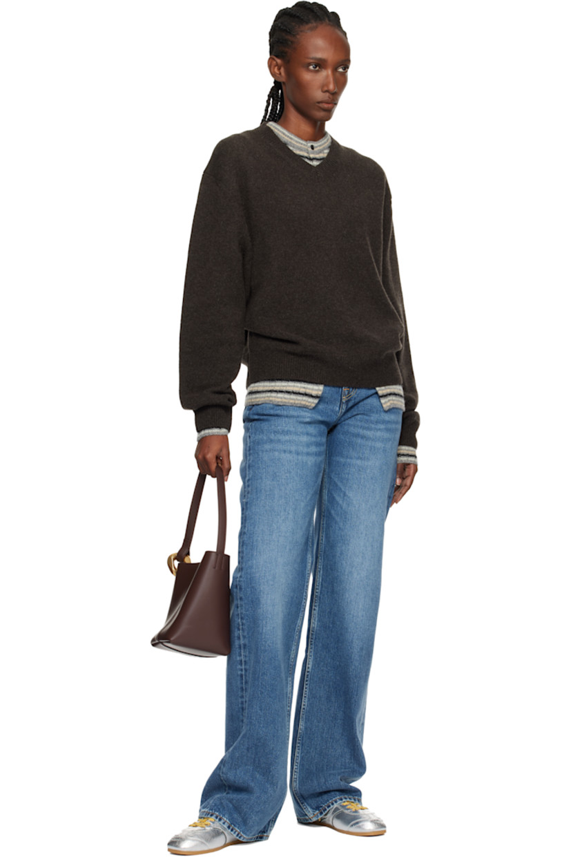 Grained calfskin tote.

· Curb chain link at fixed shoulder strap
· Logo embossed at face
· Magnetic press-stud closure 
· Patch pocket at interior
· Suede lining
· H7.5" x W9" x D5"

Supplier color: Deep walnut