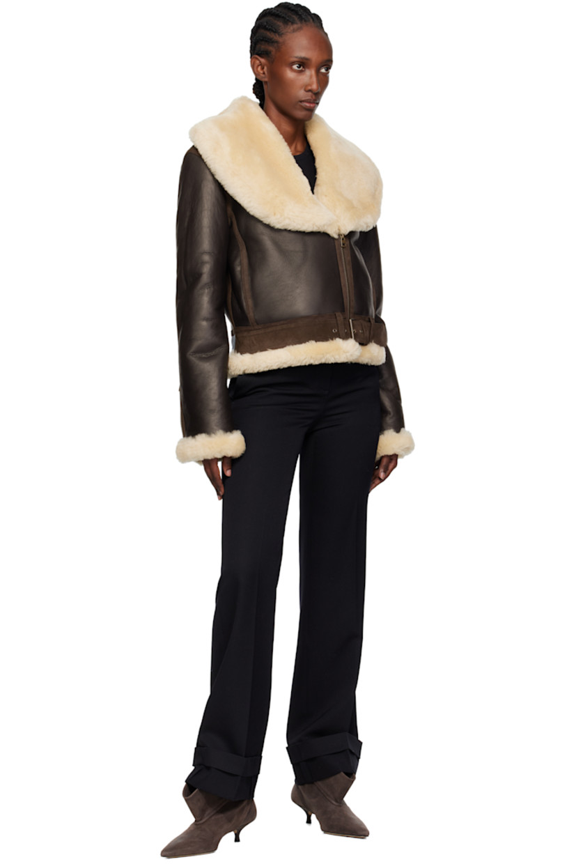 Grained sheepskin jacket.

· Sheepskin suede trim throughout
· Shearling trim at shawl collar, hem, and cuffs
· Zip closure
· Seam pockets
· Pin-buckle fastening at hem
· Zip expansion panel at cuffs
· Shearling interior

Supplier color: Dark brown