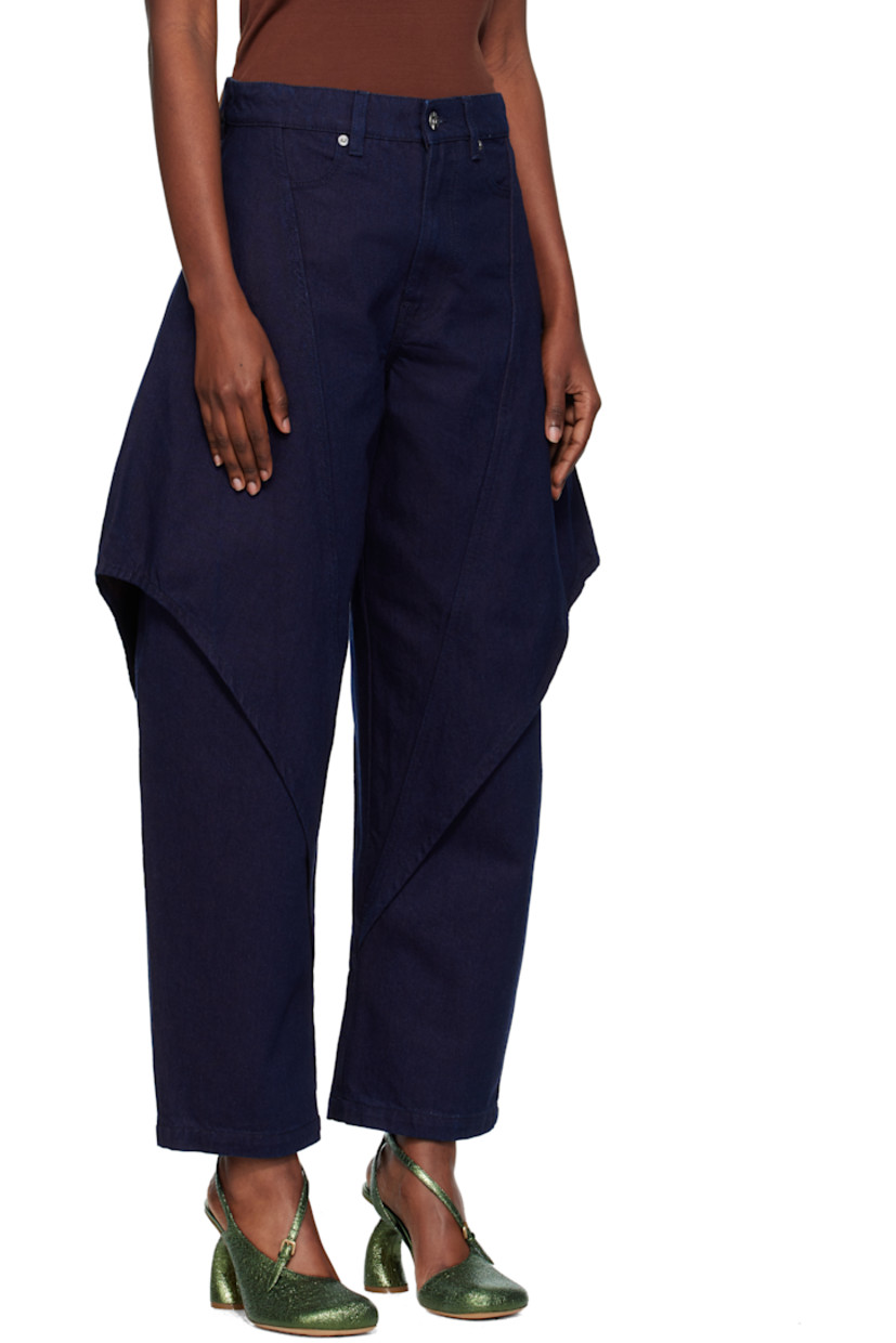 Non-stretch denim jeans.

· Belt loops
· Four-pocket styling
· Zip fly
· Overlay at legs
· Logo patch at back waistband

Supplier color: Blue/Red