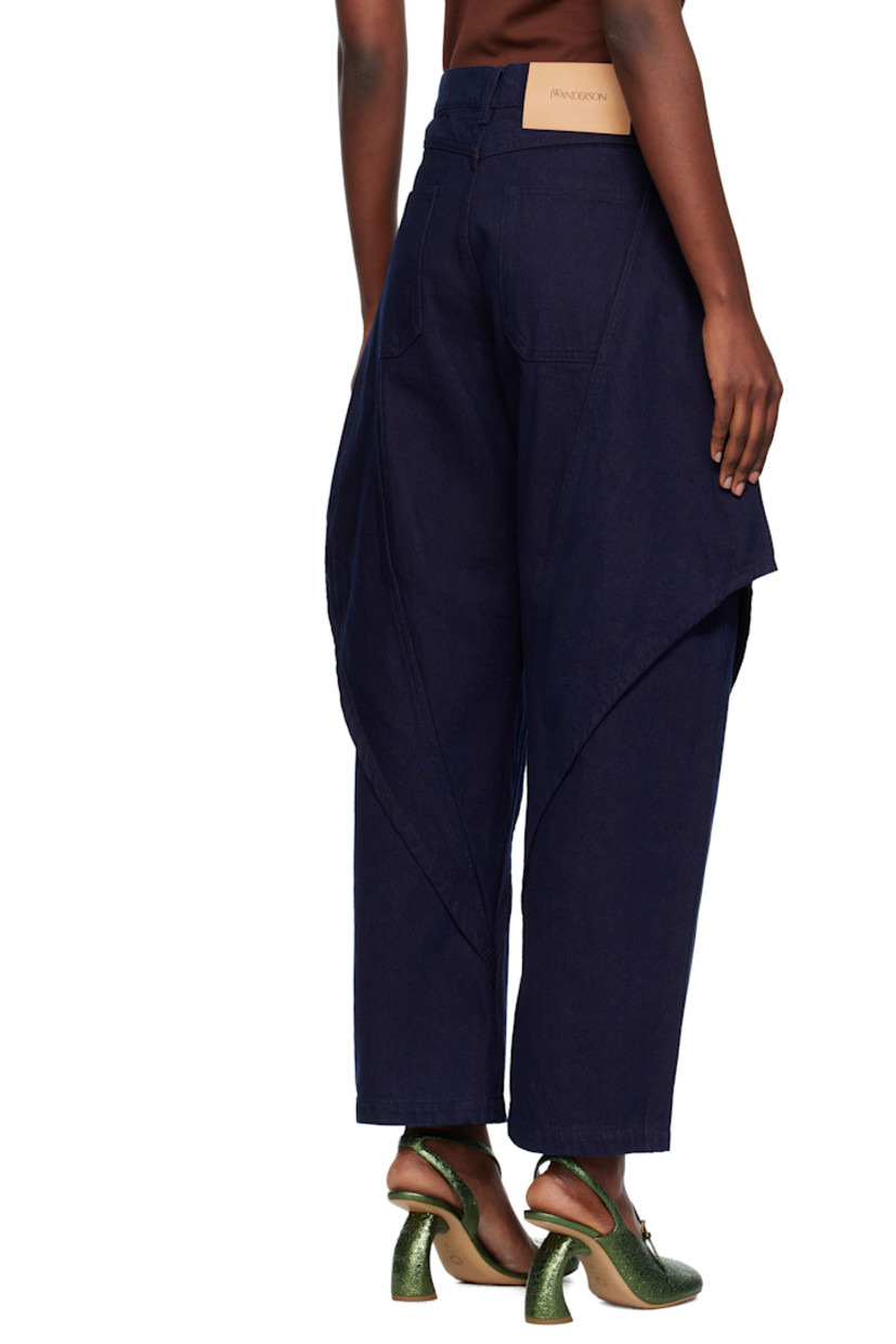 Non-stretch denim jeans.

· Belt loops
· Four-pocket styling
· Zip fly
· Overlay at legs
· Logo patch at back waistband

Supplier color: Blue/Red