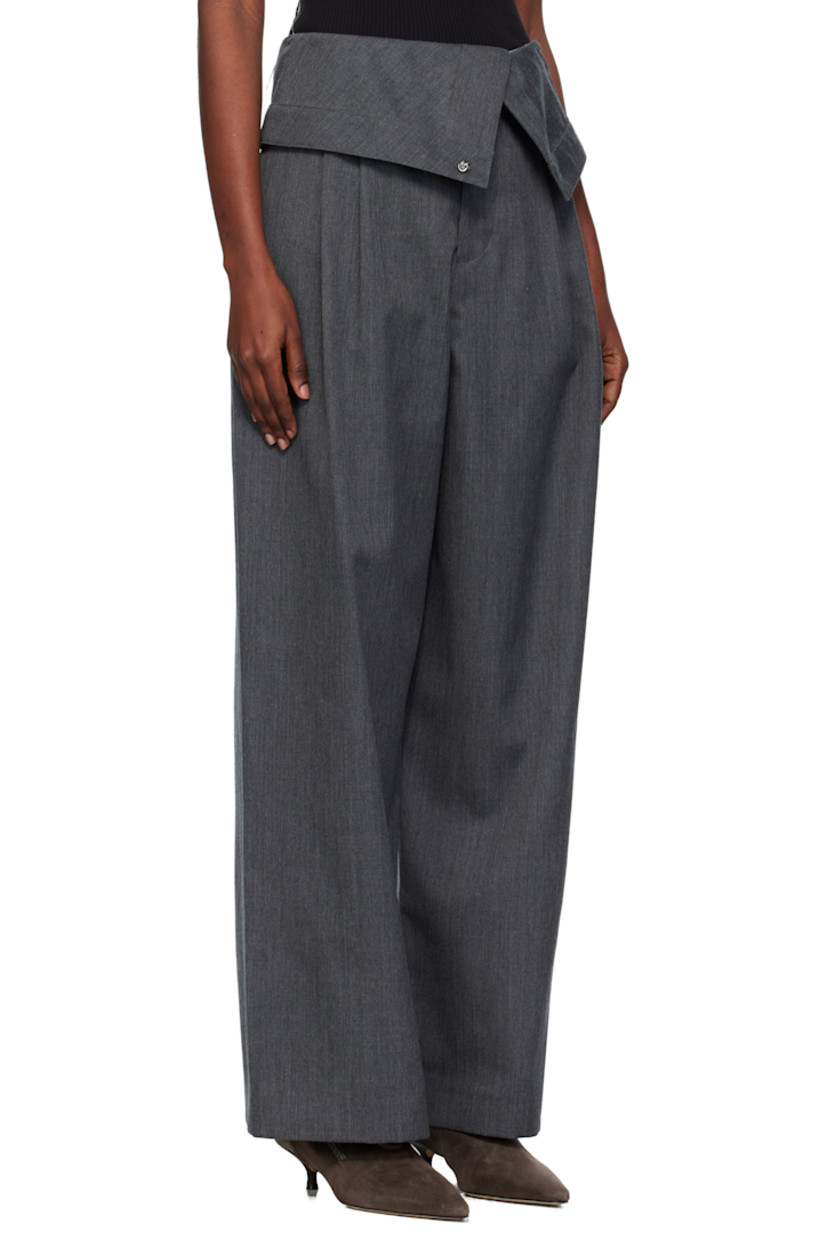 Wool twill trousers.

· Foldover waistband
· Four-pocket styling
· Zip fly
· Pleats at front

Supplier color: Charcoal melange