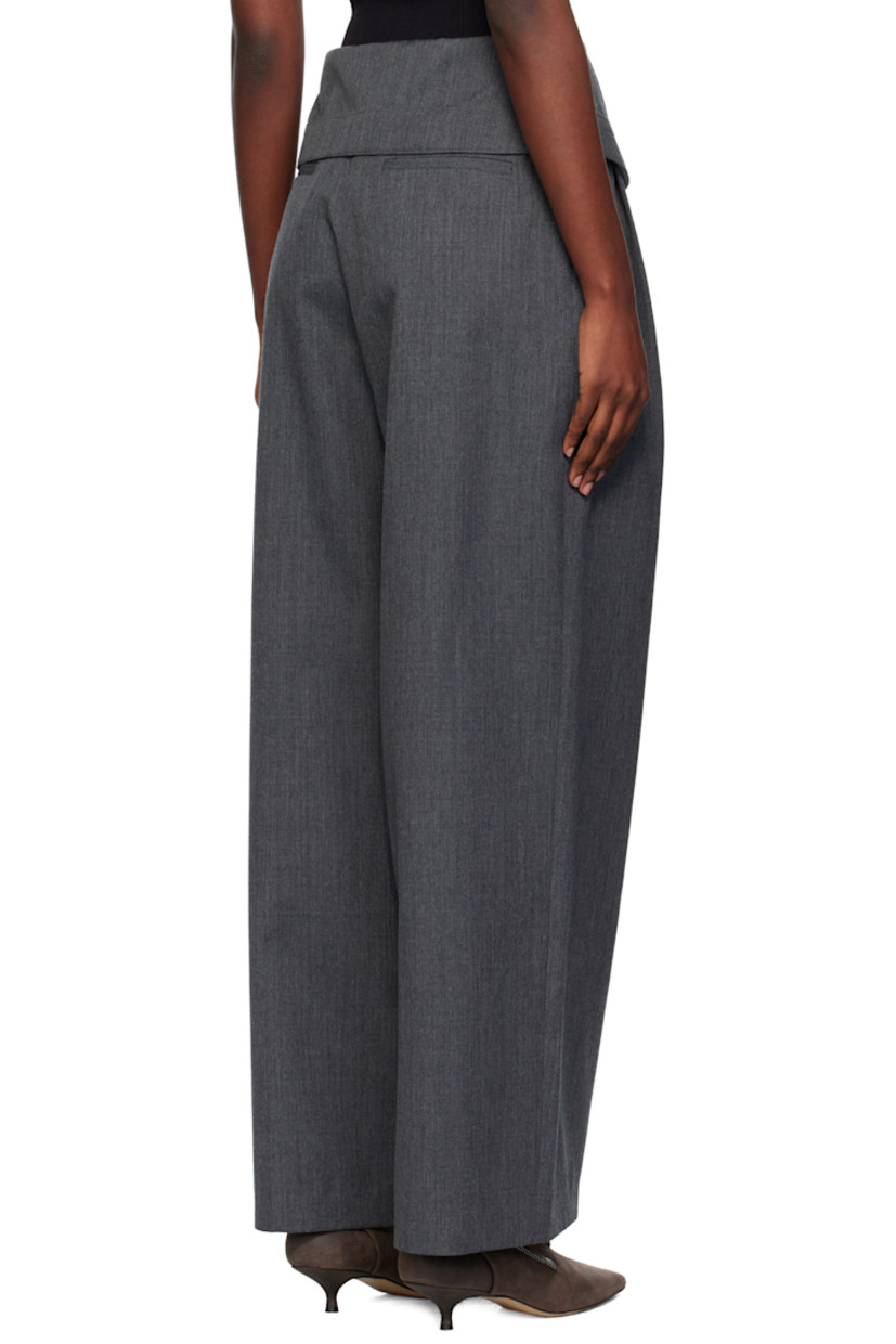 Wool twill trousers.

· Foldover waistband
· Four-pocket styling
· Zip fly
· Pleats at front

Supplier color: Charcoal melange