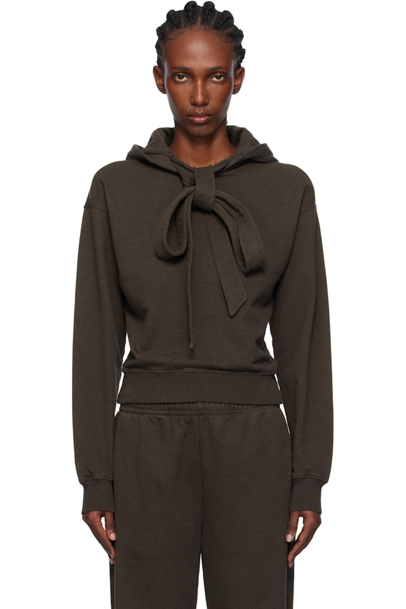 French terry hoodie.

· Drawstring at hood
· Rib-knit hem and cuffs
· Dropped shoulders
· Logo embroidered at back

Supplier color: Dark brown melange