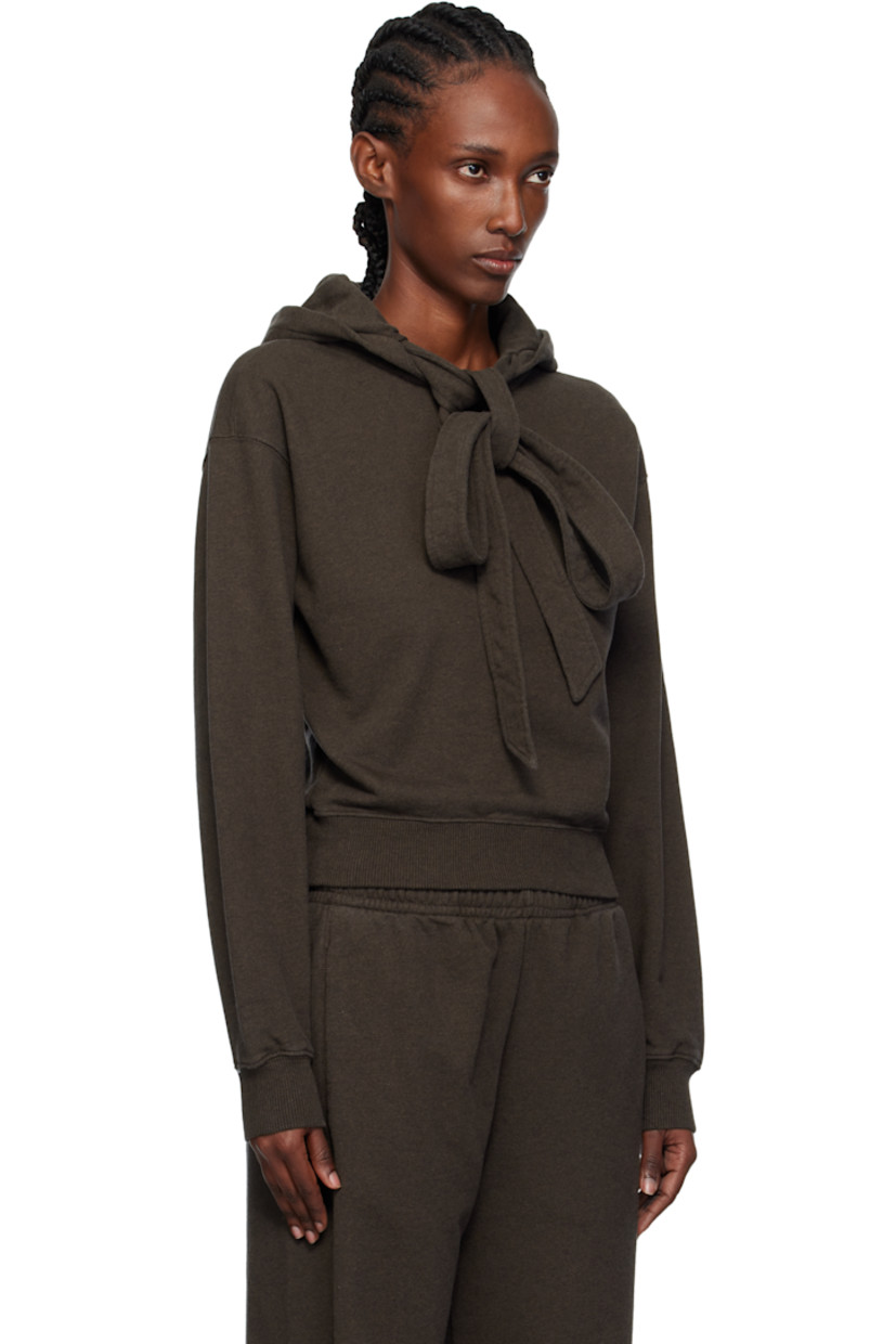 French terry hoodie.

· Drawstring at hood
· Rib-knit hem and cuffs
· Dropped shoulders
· Logo embroidered at back

Supplier color: Dark brown melange