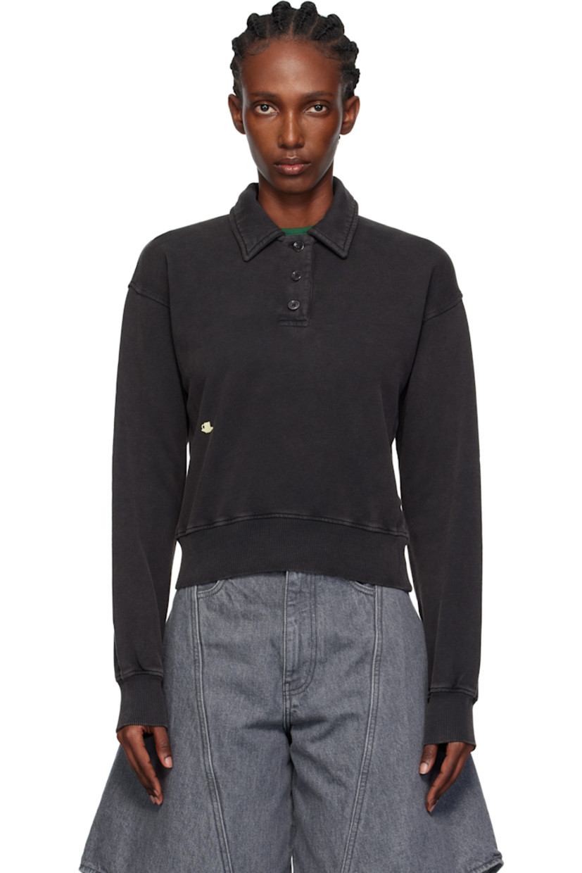 French terry polo.

· Fading throughout
· Spread collar
· Three-button placket
· Graphic embroidered at front
· Rib-knit hem and cuffs
· Logo embroidered at back

Supplier color: Washed black