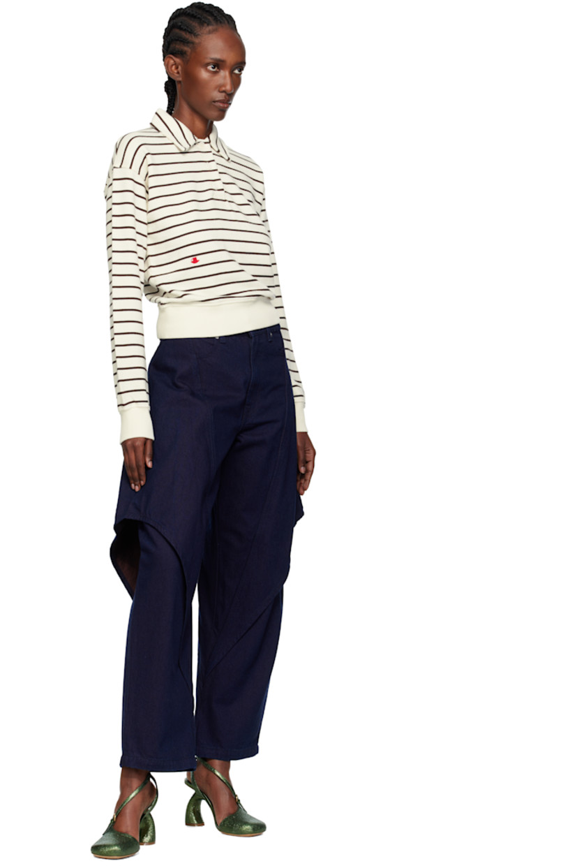 French terry polo.

· Stripes throughout
· Spread collar
· Three-button placket
· Logo embroidered at front
· Rib-knit hem and cuffs
· Logo embroidered at back

Supplier color: Off-white/Brown