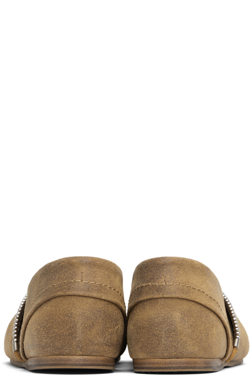 Blistered suede ballerina flats. 
 
· Logo-engraved zip detailing at vamp
· Calfskin lining 
· Leather sole with rubber injection
· Silver-tone hardware

Supplier color: Rust