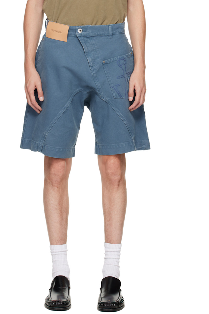 Non-stretch denim shorts.

· Asymmetrical construction 
· Fading and whiskering throughout
· Belt loops
· Four-pocket styling
· Zip fly
· Logo patch at front waistband
· Logo embroidered at front 

Supplier color: Steel blue