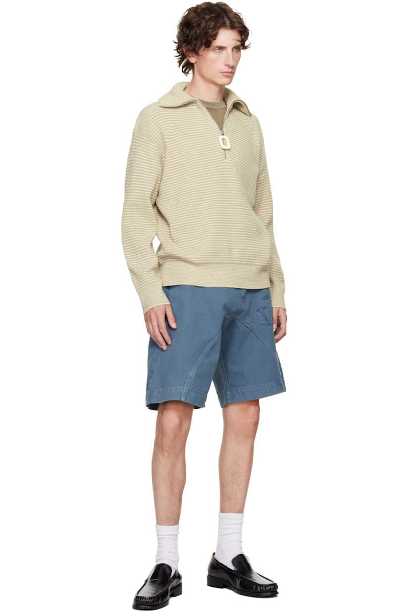 Non-stretch denim shorts.

· Asymmetrical construction 
· Fading and whiskering throughout
· Belt loops
· Four-pocket styling
· Zip fly
· Logo patch at front waistband
· Logo embroidered at front 

Supplier color: Steel blue