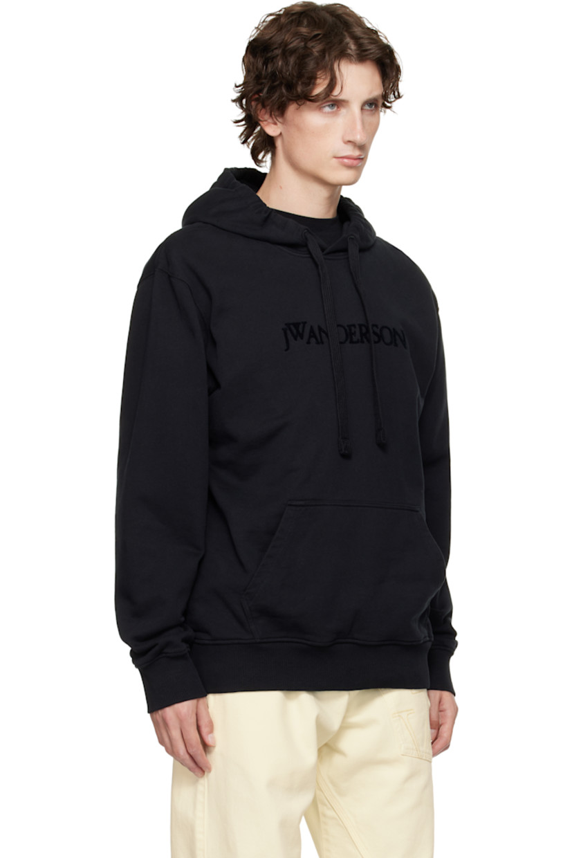 French terry hoodie. 

· Drawstring at hood
· Flocked logo at chest
· Kangaroo pocket at waist
· Rib-knit hem and cuffs
· Dropped shoulders

Supplier color: Black