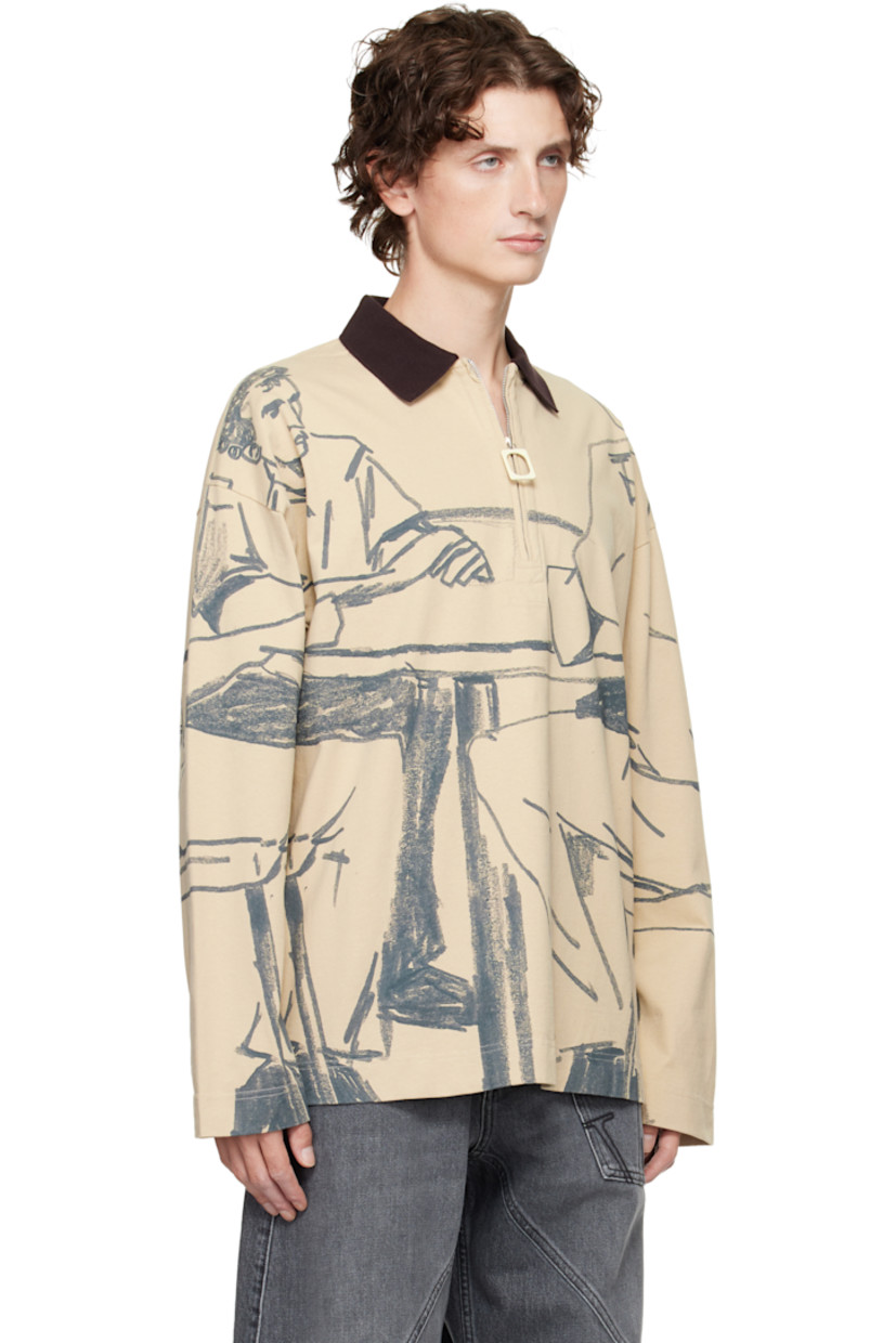 Cotton jersey polo.

· Graphics printed throughout 
· Rib-knit spread collar
· Half-zip closure
· Vented side seams
· Dropped shoulders
· Logo embroidered at back collar 

Supplier color: Nougat