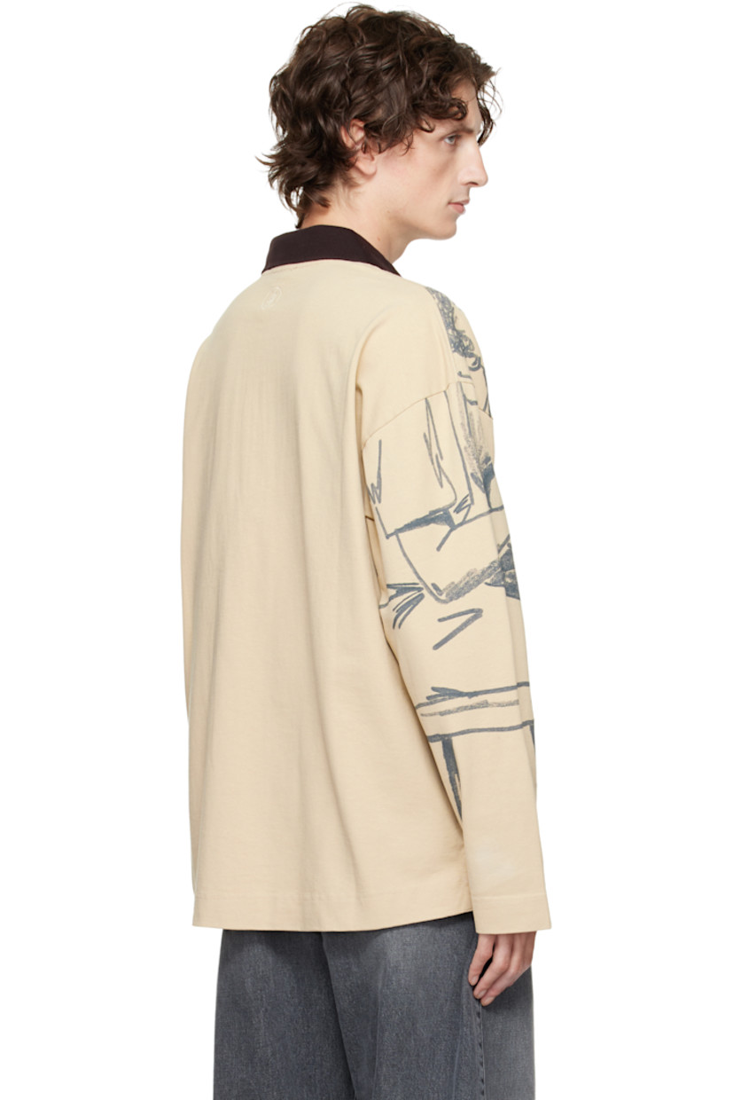 Cotton jersey polo.

· Graphics printed throughout 
· Rib-knit spread collar
· Half-zip closure
· Vented side seams
· Dropped shoulders
· Logo embroidered at back collar 

Supplier color: Nougat