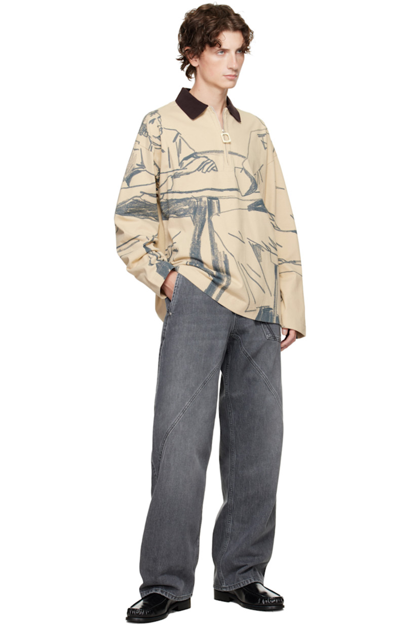 Cotton jersey polo.

· Graphics printed throughout 
· Rib-knit spread collar
· Half-zip closure
· Vented side seams
· Dropped shoulders
· Logo embroidered at back collar 

Supplier color: Nougat