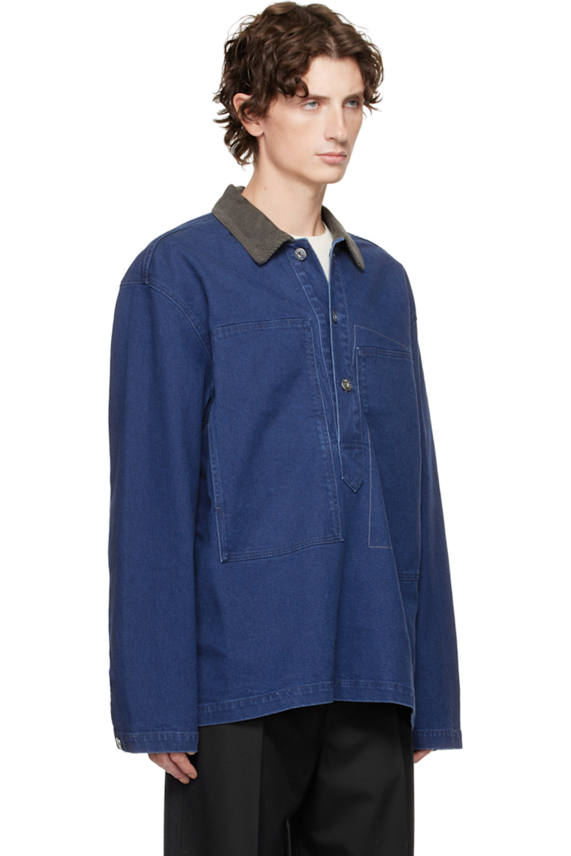 Non-stretch denim polo. 

· Fading throughout 
· Cotton corduroy spread collar 
· Three-button placket 
· Patch pockets at front 
· Dropped shoulders
· Buttoned barrel cuffs
· Logo patch at back collar

Supplier color: Bright blue