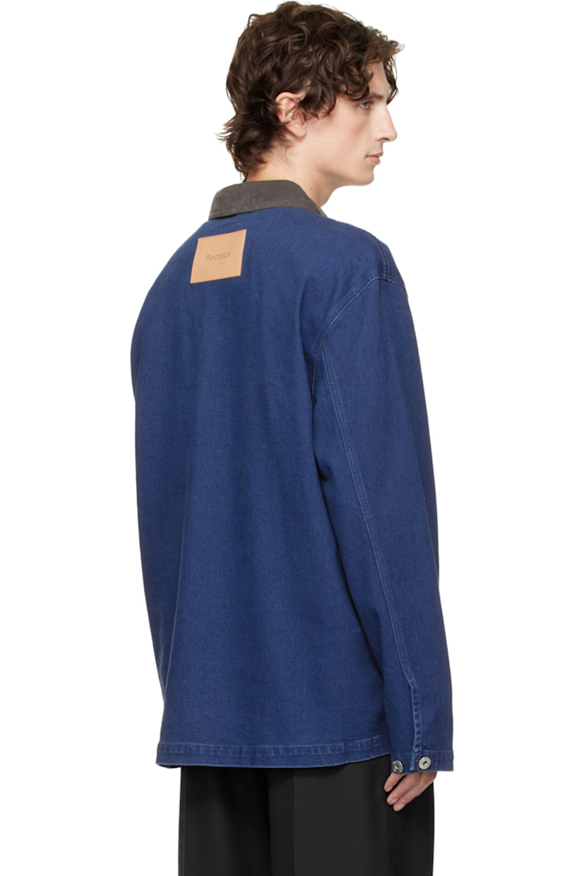 Non-stretch denim polo. 

· Fading throughout 
· Cotton corduroy spread collar 
· Three-button placket 
· Patch pockets at front 
· Dropped shoulders
· Buttoned barrel cuffs
· Logo patch at back collar

Supplier color: Bright blue