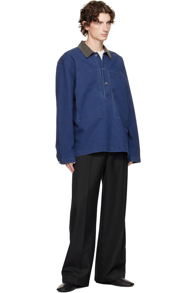 Non-stretch denim polo. 

· Fading throughout 
· Cotton corduroy spread collar 
· Three-button placket 
· Patch pockets at front 
· Dropped shoulders
· Buttoned barrel cuffs
· Logo patch at back collar

Supplier color: Bright blue