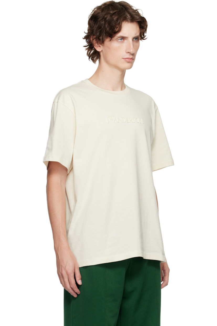 Cotton jersey T-shirt. 

· Rib-knit crewneck
· Flocked logo at chest

Supplier color: Off-white