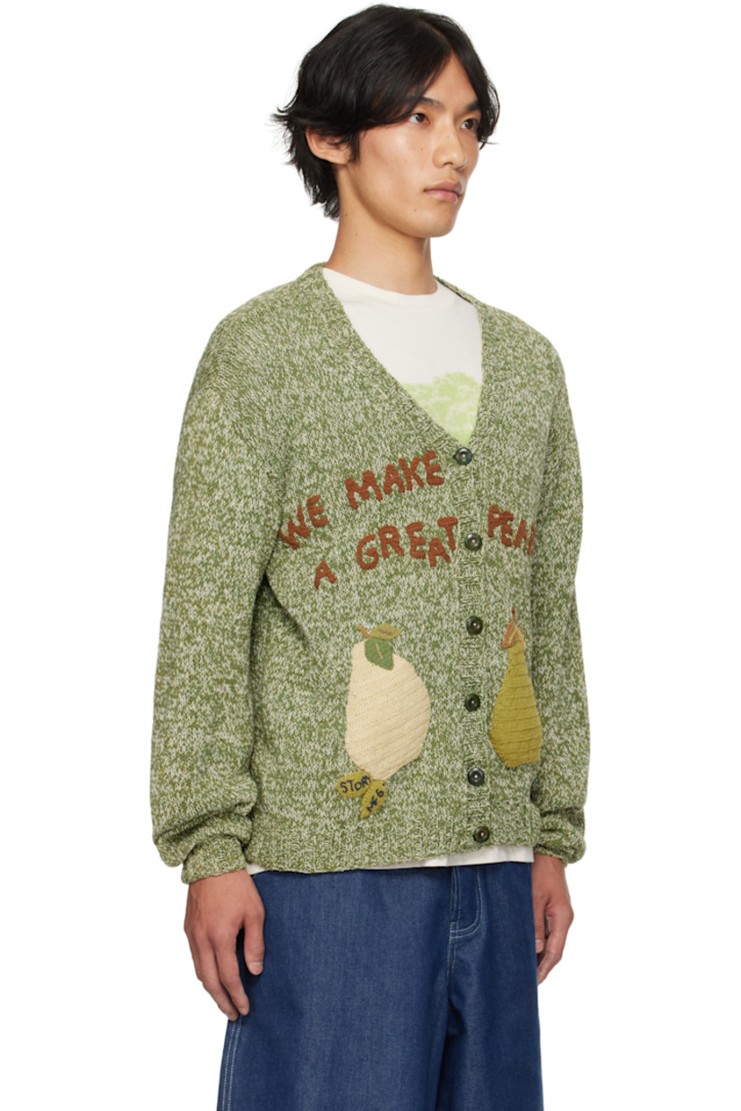 Natural dyed hand-knit organic cotton cardigan.  Dyed with natural indigo, pomegranate, kaduka, palapattai and karuvelam pattai bark, and sevilokodi flower.

· V-neck
· Button closure
· Hand-crocheted graphics at front
· Stitched logo at front hem
· Corozo hardware

Supplier color: Green Pears