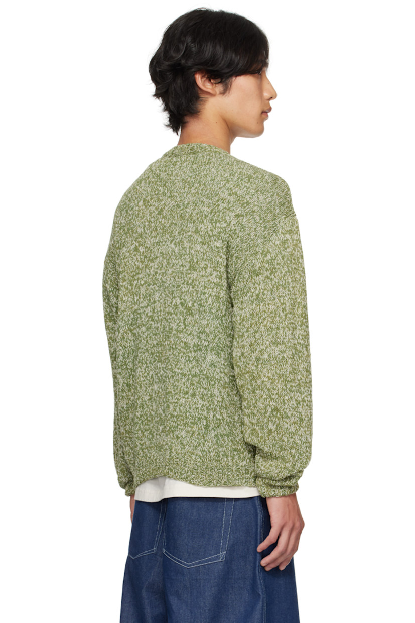 Natural dyed hand-knit organic cotton cardigan.  Dyed with natural indigo, pomegranate, kaduka, palapattai and karuvelam pattai bark, and sevilokodi flower.

· V-neck
· Button closure
· Hand-crocheted graphics at front
· Stitched logo at front hem
· Corozo hardware

Supplier color: Green Pears