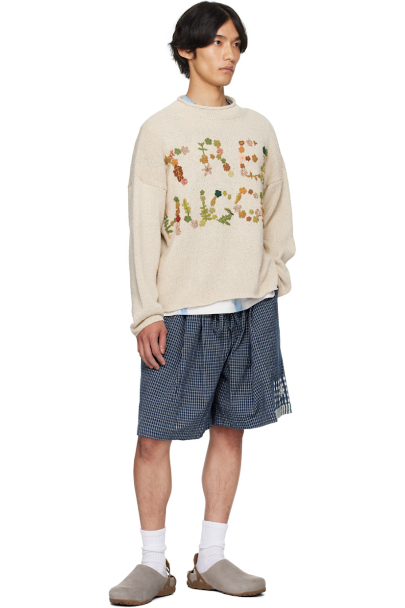 Hand-knit organic cotton sweater. Dyed with natural indigo, pomegranate, kaduka, karuvelam pattai bark, and sevilokodi flower.

· Rolled edge at crewneck
· Hand crocheted floral text at front
· Dropped shoulders

Supplier color: Ecru Tree Hugger