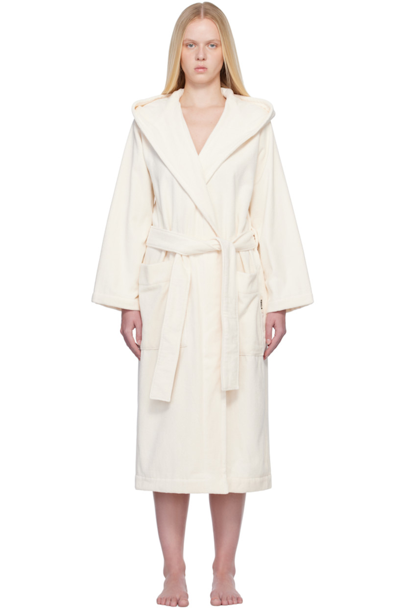 Heavyweight 385 gsm organic cotton terrycloth bathrobe. 

· Certified GOTS and OEKO-TEX® Standard 100
· Hood at shawl lapel
· Open front
· Belt loops and detachable self-tie belt
· Patch pockets
· Logo flag at side seam
· Locker loop at inner collar

Supplier color: Ivory
