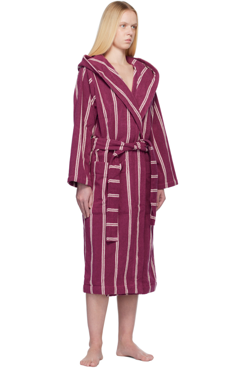 Heavyweight 385 gsm organic cotton terrycloth bathrobe. Stripes throughout.

· Certified GOTS and OEKO-TEX® Standard 100
· Hood at shawl lapel
· Open front
· Belt loops and detachable self-tie belt
· Patch pockets
· Logo flag at side seam
· Locker loop at inner collar

Supplier color: Venice stripes