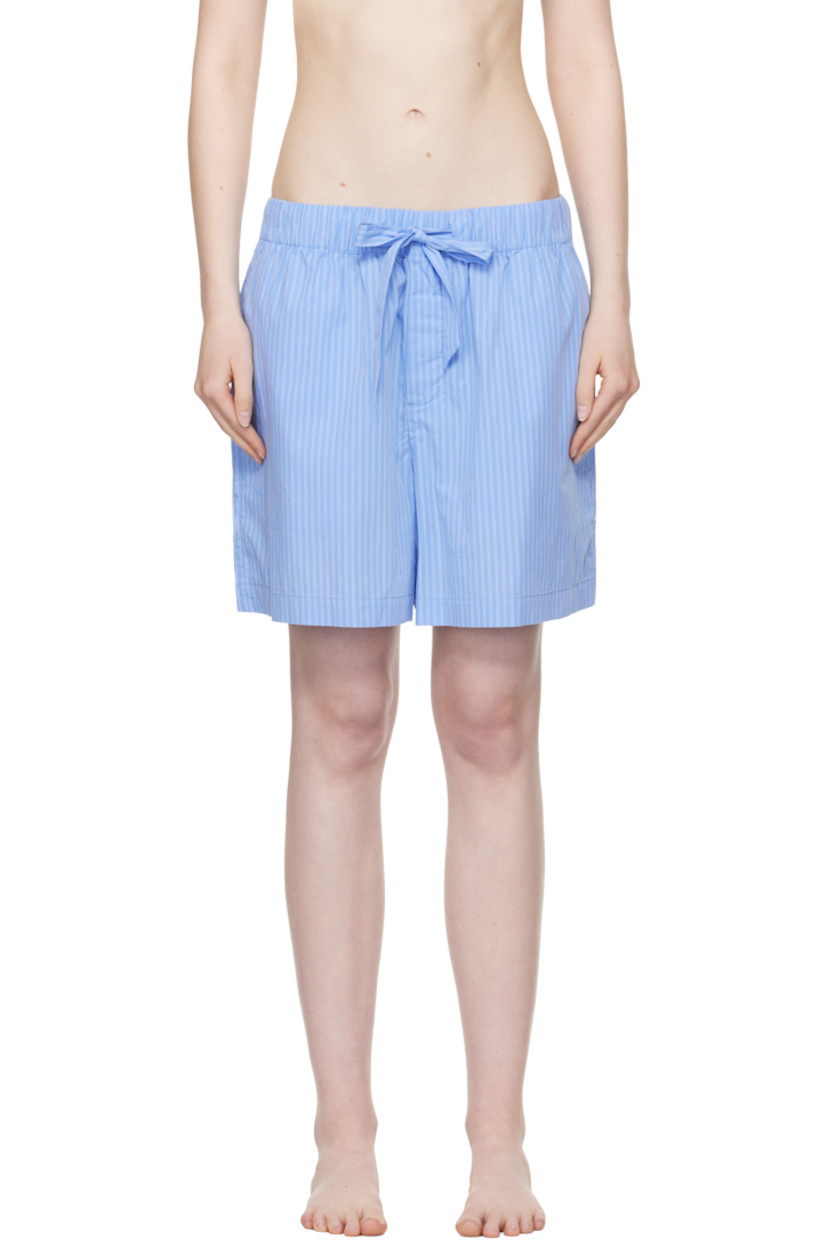Lightweight organic cotton poplin pyjama shorts. Pinstripes throughout.

· Certified OEKO-TEX® Standard 100
· Wide-leg 
· Stonewashed
· Drawstring at elasticized waistband
· Four-pocket styling
· Button fly
· Logo patch at back pocket
· French seams at interior
· Mother-of-pearl hardware
 
Supplier color: Pin stripes