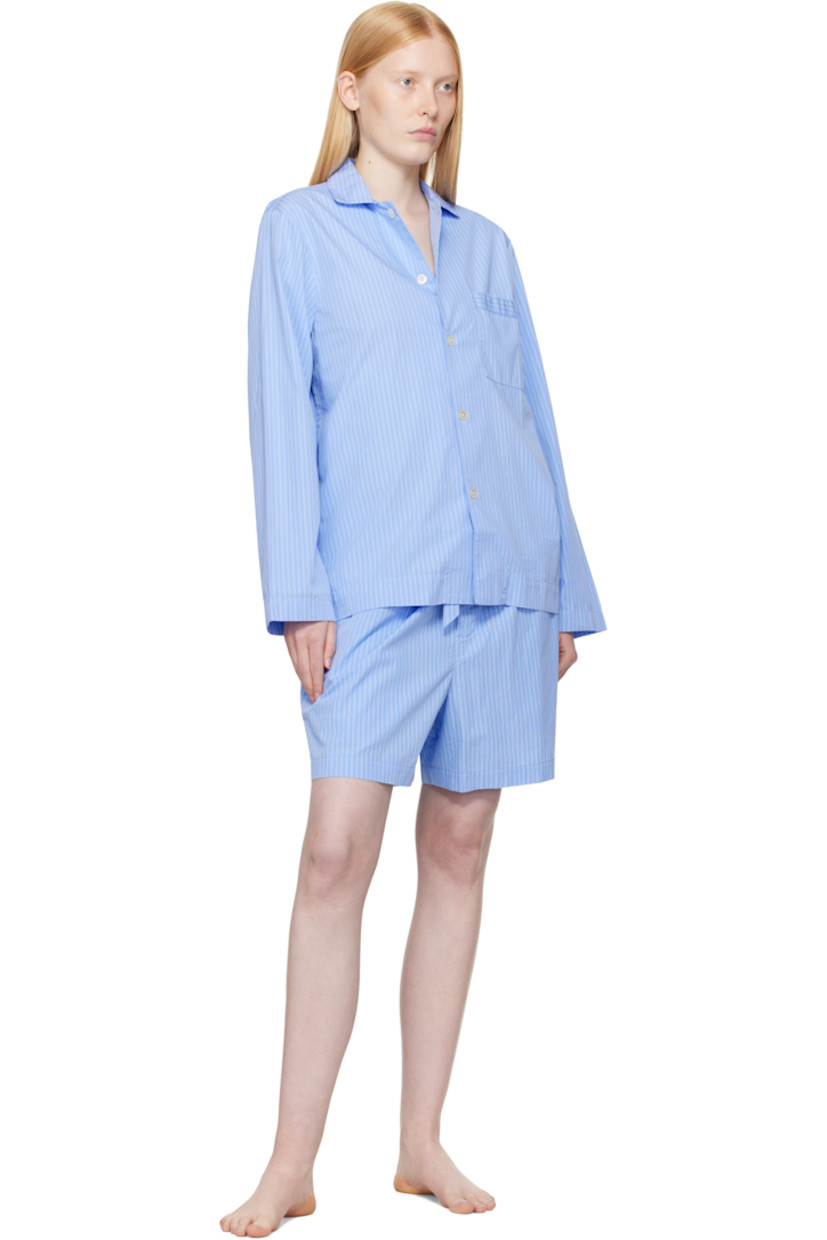Lightweight organic cotton poplin pyjama shorts. Pinstripes throughout.

· Certified OEKO-TEX® Standard 100
· Wide-leg 
· Stonewashed
· Drawstring at elasticized waistband
· Four-pocket styling
· Button fly
· Logo patch at back pocket
· French seams at interior
· Mother-of-pearl hardware
 
Supplier color: Pin stripes