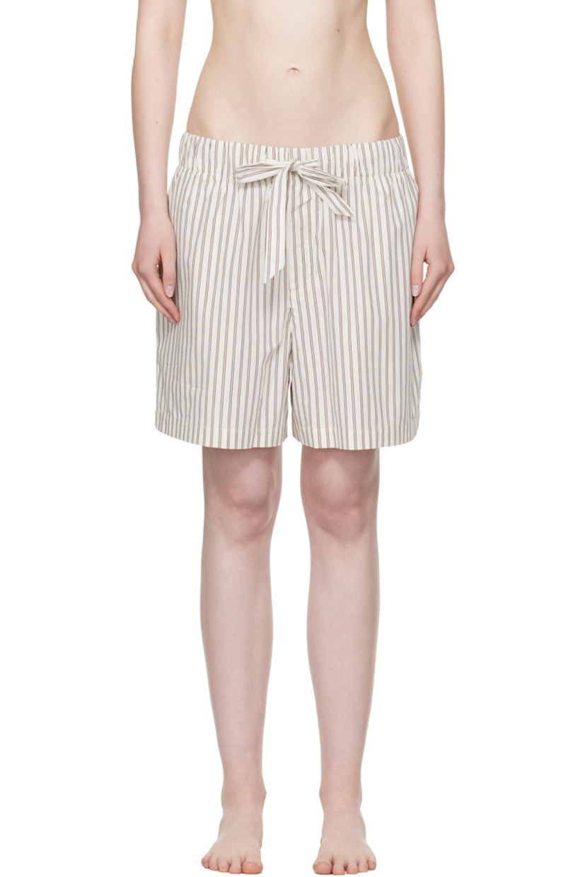 Lightweight organic cotton poplin pyjama shorts. Stripes throughout.

· Certified OEKO-TEX® Standard 100
· Wide-leg 
· Stonewashed
· Drawstring at elasticized waistband
· Four-pocket styling
· Button fly
· Logo patch at back pocket
· French seams at interior
· Mother-of-pearl hardware
 
Supplier color: Hopper stripes