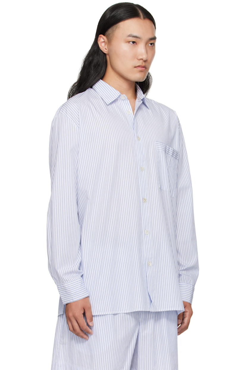 Organic cotton poplin pyjama shirt. 

· GOTS-certified cotton 
· Stripes throughout 
· Spread collar 
· Button closure
· Patch pocket at chest
· Vented side seams 
· Box pleat at back yoke 

Supplier color: Orchid stripes