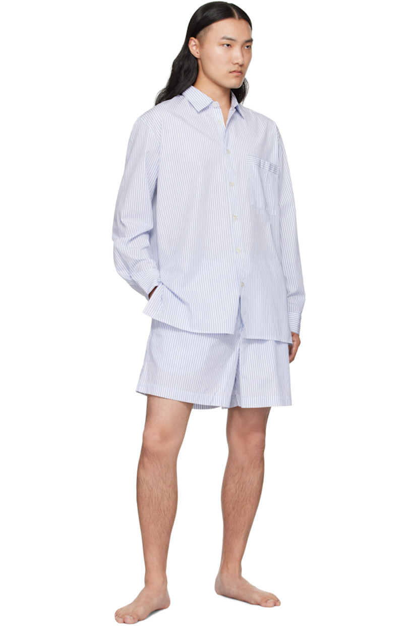 Organic cotton poplin pyjama shirt. 

· GOTS-certified cotton 
· Stripes throughout 
· Spread collar 
· Button closure
· Patch pocket at chest
· Vented side seams 
· Box pleat at back yoke 

Supplier color: Orchid stripes
