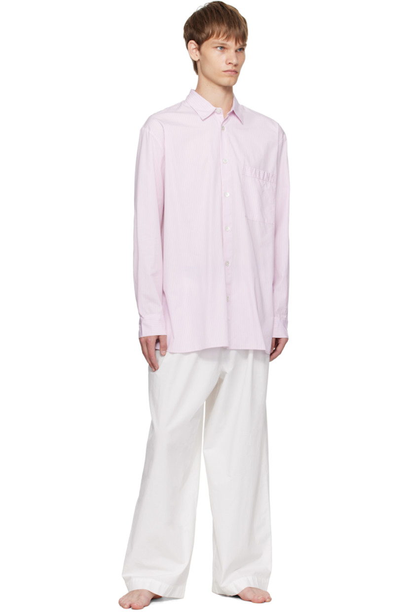 Lightweight organic cotton poplin pyjama shirt. 

· Certified OEKO-TEX Standard 100
· Stripes throughout
· Spread collar
· Button closure
· Patch pocket at chest
· French seams at interior
· Mother-of-pearl hardware

Supplier color: Rosa stripes