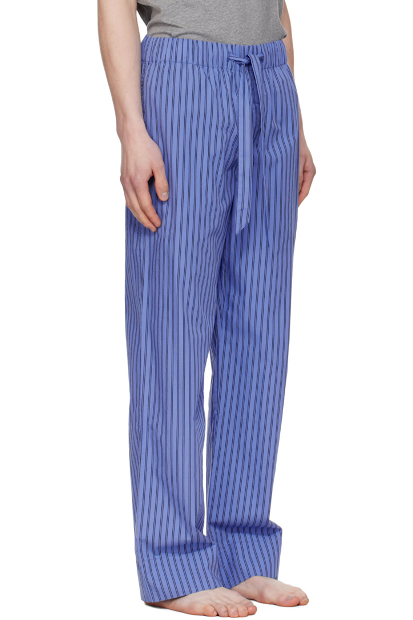 Lightweight organic cotton poplin pyjama pants. Stripes throughout.

· Certified OEKO-TEX® Standard 100
· Straight-leg and loose-fit 
· Stonewashed
· Drawstring at elasticized waistband
· Three-pocket styling
· Button fly
· Logo patch at back pocket
· French seams at interior
· Mother-of-pearl hardware

Supplier color: Boro stripes